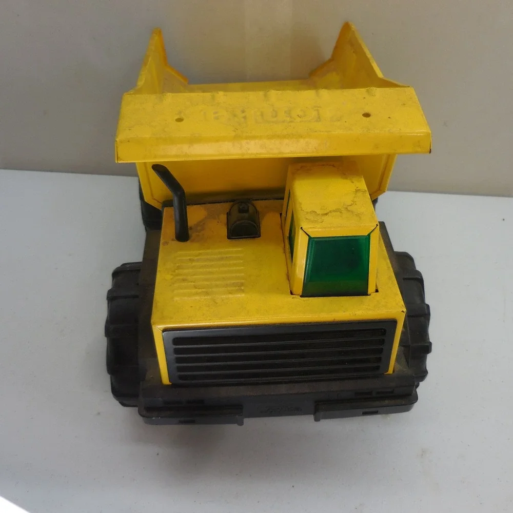 Vintage Tonka Mighty Diesel Dump Truck Yellow Pressed Steel Construction Toy